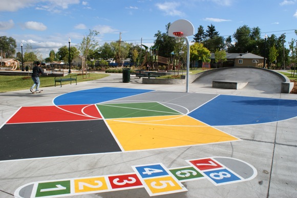 The basketball court and hopscotch area.