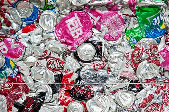 Crushed cans in the recycling area of the Coca-Cola bottling plant.  