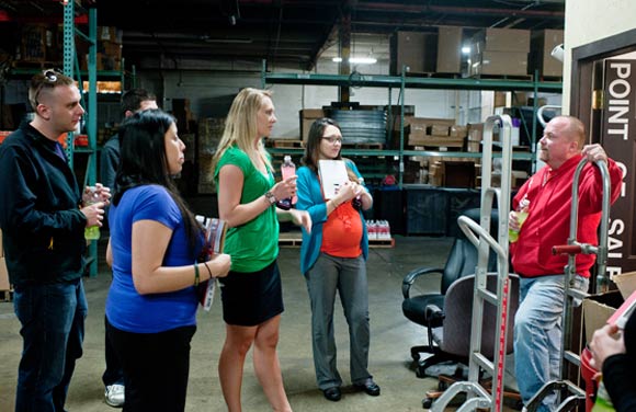 CSU Supply Chain Management students get feedback from a Coca-Cola employee.