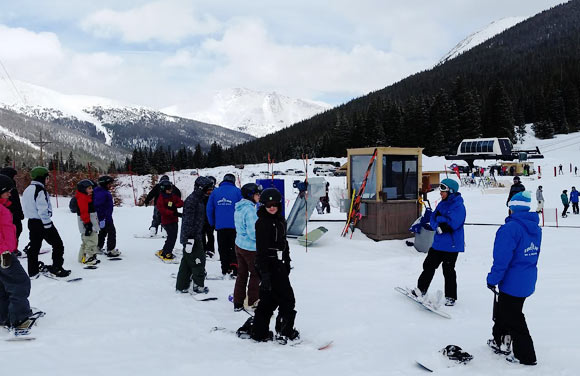 Several nonprofits are working to bring underprivileged kids from Denver to the mountains for skiing, snowboarding and life lessons.