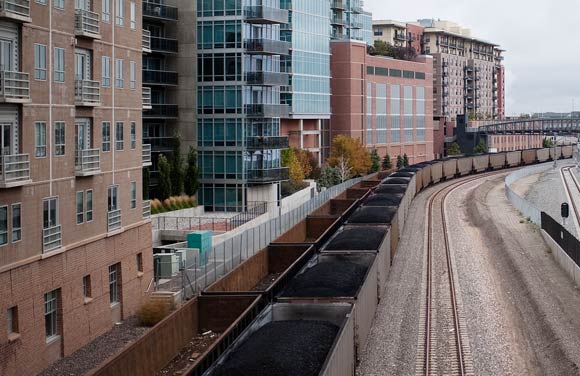 Denver's railroad is in places an industrial gash cutting through a vibrant city.