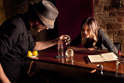 Bartender Adam Hodak makes a cocktail at the Green Russell in LoDo. 